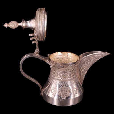Lot 1177 - A Middle Eastern white metal dallah coffee pot,...