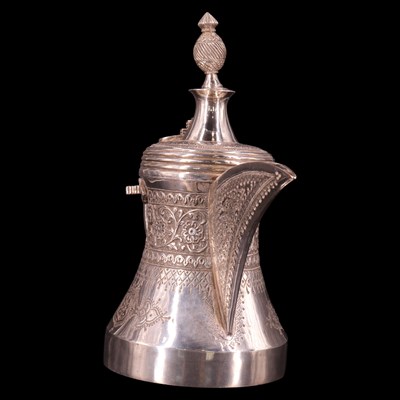 Lot 1177 - A Middle Eastern white metal dallah coffee pot,...