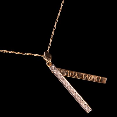 Lot 1312 - A near-contemporary romantic diamond pendant,...