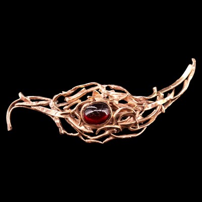 Lot 1321 - A Modernist artisanal garnet and 9 ct...