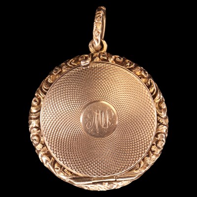 Lot 1316 - A 19th Century 9 ct gold mourning pendant...