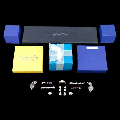 Lot 1252 - A group of contemporary gemstone-set white...