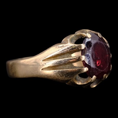 Lot 1329 - A late 20th Century garnet and 9 ct gold...