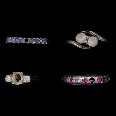 Lot 1330 - Three vintage gemstone-set yellow metal rings,...