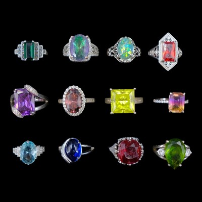 Lot 1262 - A group of contemporary gem-set white metal...
