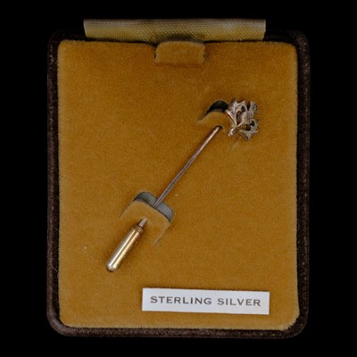 Lot 1301 - A vintage Scottish Ortak white metal stick pin,...