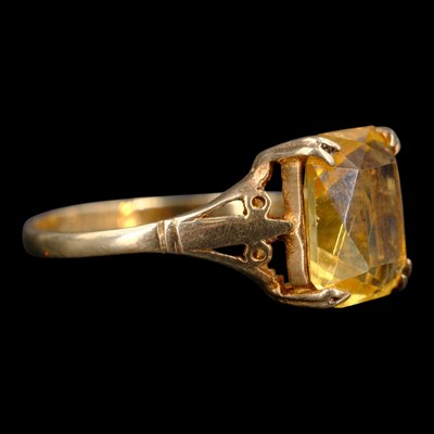 Lot 1335 - A 1960s citrine dress ring, comprising an...