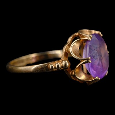 Lot 1336 - A 1970s amethyst solitaire ring, comprising a...