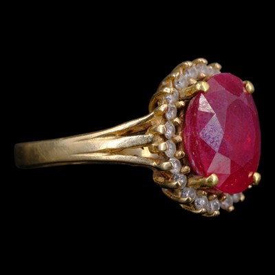 Lot 1337 - A vintage ruby and diamond cluster...