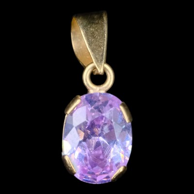 Lot 1341 - A contemporary amethyst pendant, comprising an...