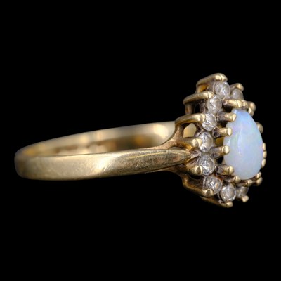 Lot 1347 - A 1980s opal and cubic zirconia pendeloque...