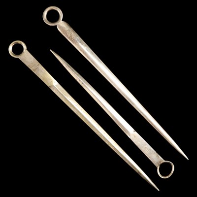Lot 1230 - Three Victorian electroplate meat skewers, one...