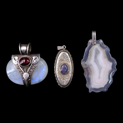 Lot 1275 - A vintage opal and silver elongated oval...
