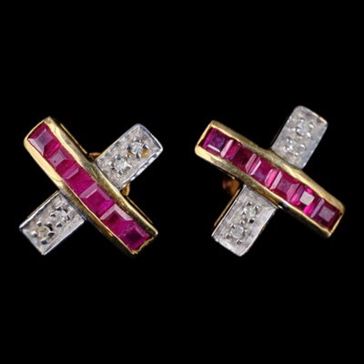 Lot 1356 - Contemporary ruby and sapphire cruciform stud...