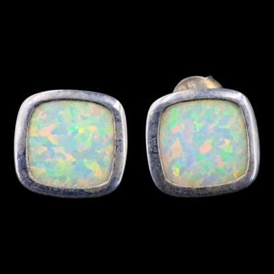 Lot 1357 - Vintage opal stud earrings, each comprising...