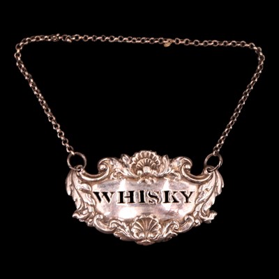 Lot 1146 - A silver "Whisky" decanter label / bottle...