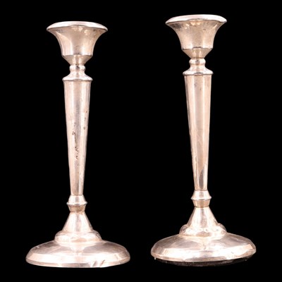 Lot 1149 - A pair of George V silver candlesticks, 22 cm,...