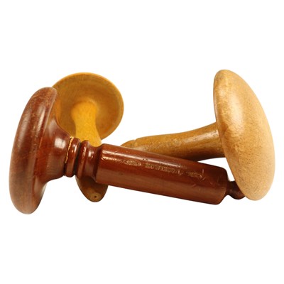 Lot 847 - Three vintage darning mushrooms, including a...