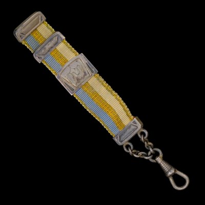 Lot 1531 - A 1914 German silver-mounted silk ribbon watch...