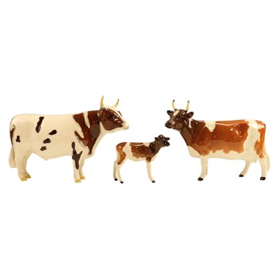 Lot 1087 - A Beswick Ayrshire cattle group, including...