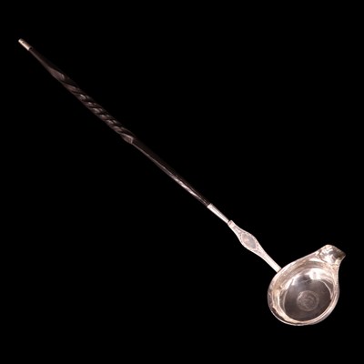 Lot 1163 - An 18th Century baleen-handled silver toddy...