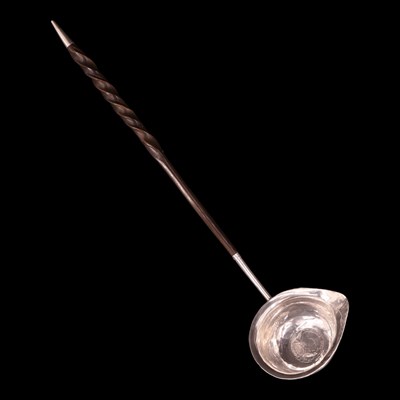 Lot 1164 - An 18th Century baleen-handled silver toddy...