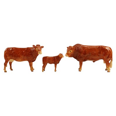 Lot 1076 - A Border Fine Arts "Limousin bull", together...