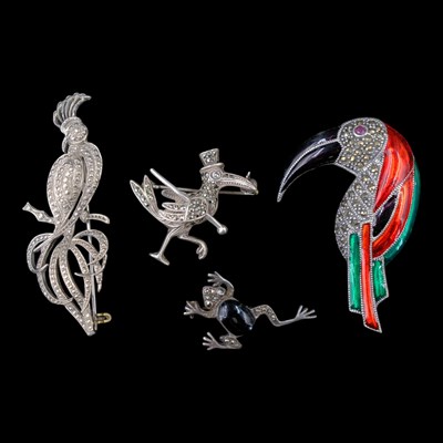 Lot 1285 - Four marcasite-set, enamelled and other white...