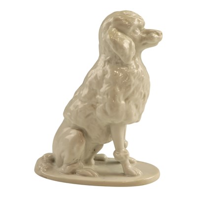 Lot 1028 - A German white-glazed porcelain figurine of a...