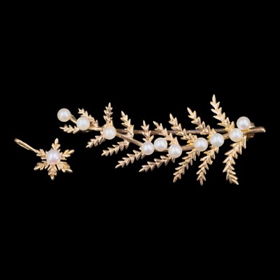 Lot 1374 - A 1980s pearl and 9 ct gold fern / heather...