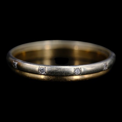 Lot 1369 - A contemporary 9 ct  and diamond interlocking...