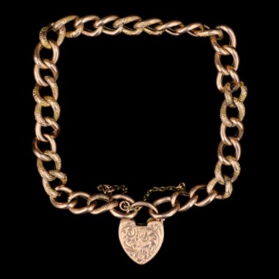 Lot 1390 - An Edwardian 9 ct rose-gold textured curb-link...