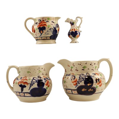 Lot 983 - Four "Gaudy Welsh" pottery jugs, tallest 14 cm