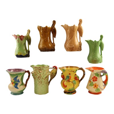 Lot 986 - A group of eight pottery jugs, including a...