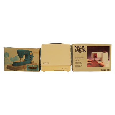 Lot 861 - Three miniature sewing machines, comprising a...