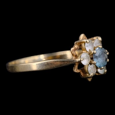 Lot 1425 - A 1970s green and white gemstone flowerhead...