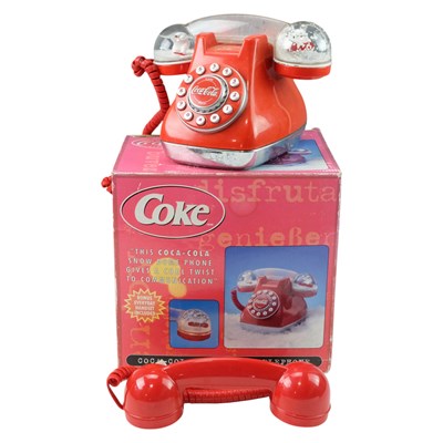 Lot 738 - A boxed 2001 Coca-Cola snow dome telephone