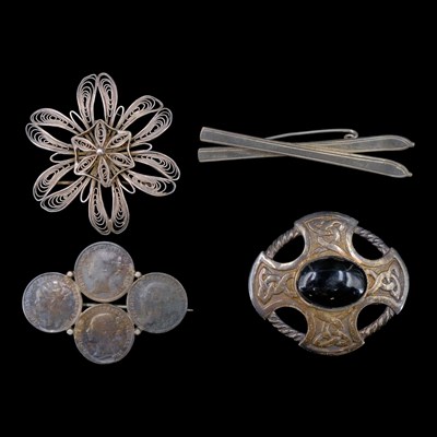 Lot 1280 - A 1970s black onyx and silver Celtic cross...