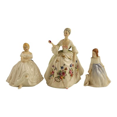 Lot 1043 - Three Royal Doulton figurines, comprising of...