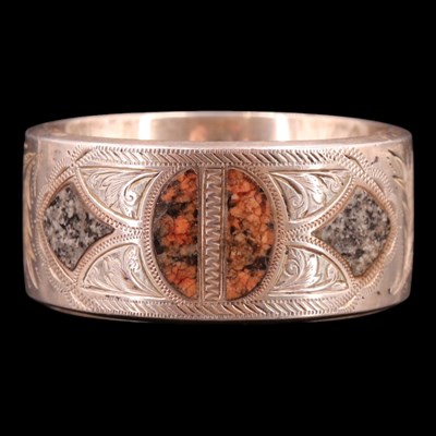 Lot 1170 - A George V silver napkin ring, inlaid with...