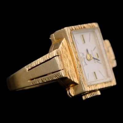 Lot 1398 - A 1960s Rotary 9 ct gold watch ring, having a...