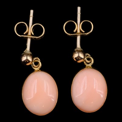 Lot 1436 - A pair of contemporary coral and 9 ct gold ear...