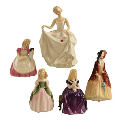 Lot 1045 - Five Royal Doulton figurines, including "Tracy"...