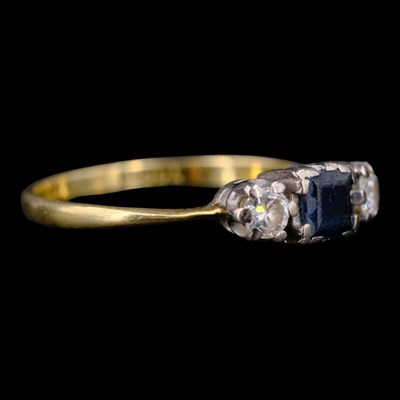 Lot 1446 - A vintage sapphire and diamond three-stone...