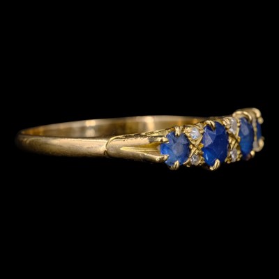 Lot 1448 - An Edwardian sapphire and diamond ring,...