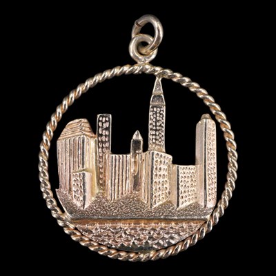Lot 1458 - A contemporary 14 ct yellow metal circular...