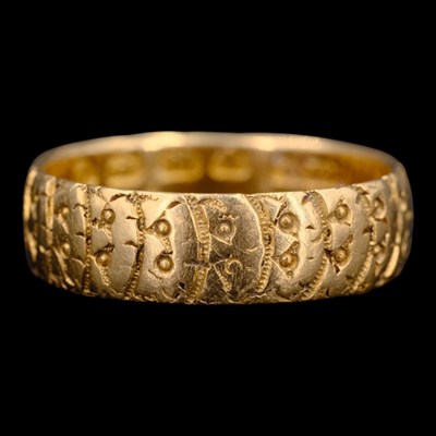 Lot 1459 - A late Victorian 18 ct gold wedding...
