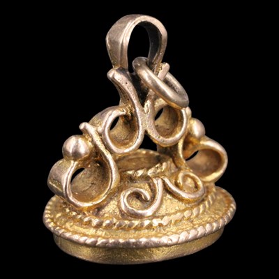 Lot 1471 - A 1980s black onyx and 9 ct gold fob seal,...