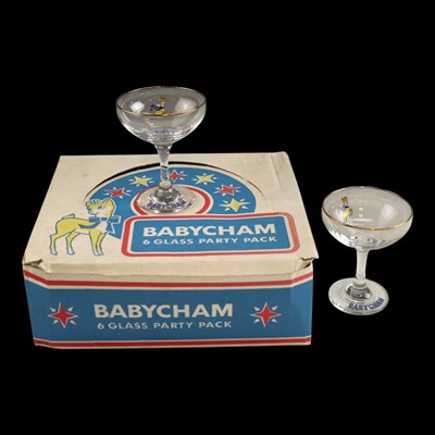 Lot 1114 - A boxed set of six Babycham glasses, each 11 cm