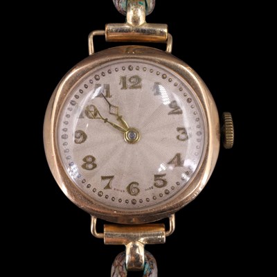 Lot 1581 - A 1920s lady's 9 ct rose-gold wristlet watch,...